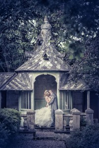 Bride and groom in garden house