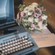 Typewriter and wedding bouquet