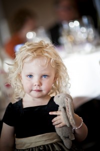 Little girl and bunny toy